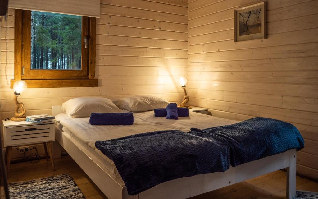 Katil atau katil-katil dalam bilik di Ungru Holiday Houses