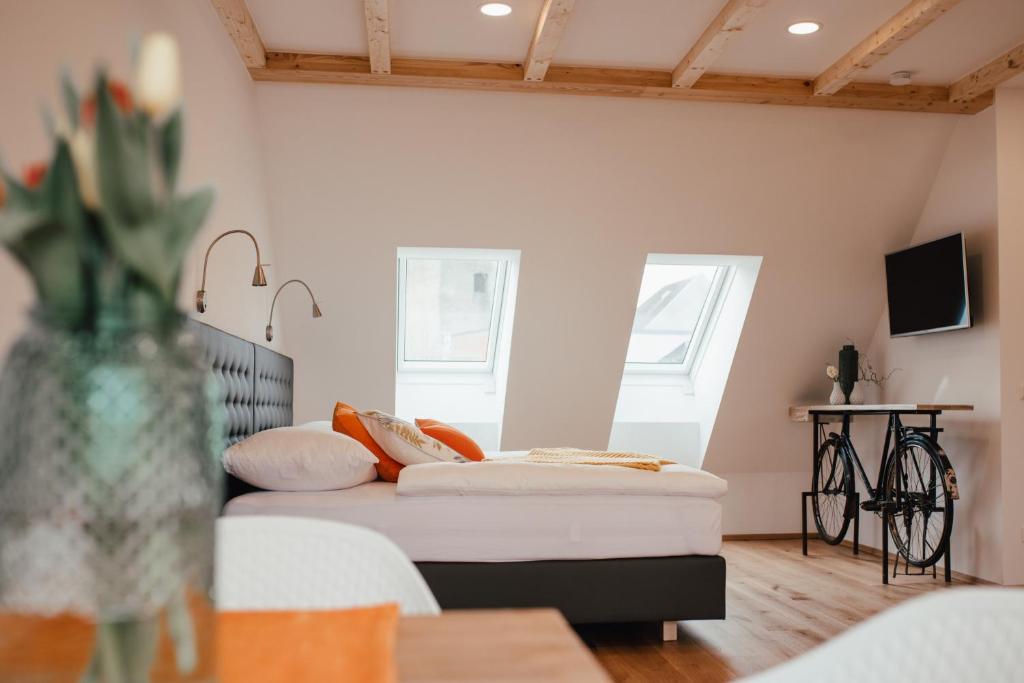 Postel nebo postele na pokoji v ubytování Smarthotel Völkermarkt