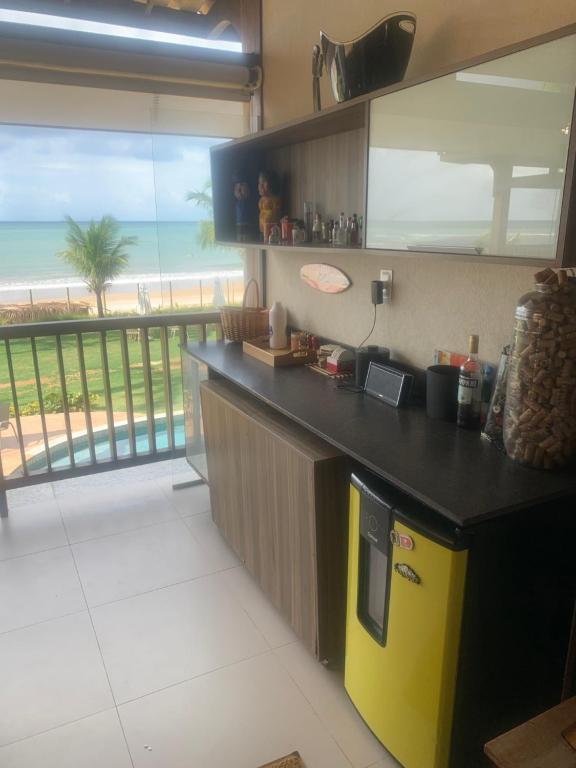 Kuchyň nebo kuchyňský kout v ubytování Bali Bahia Itacimirim