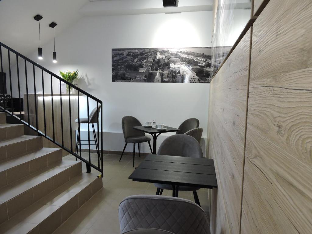 A seating area at Primma Hotel
