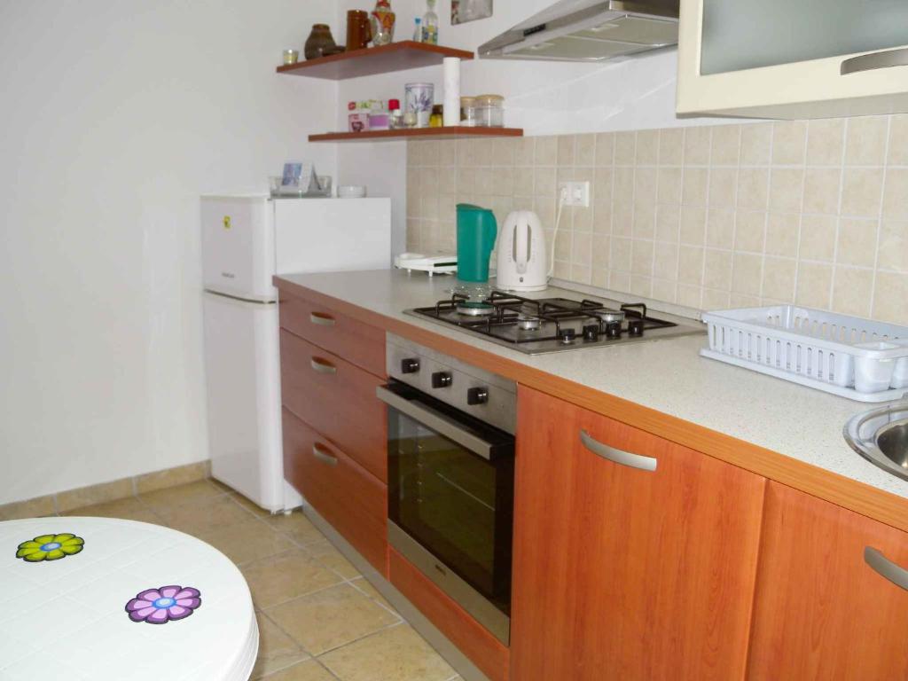 Kuchyň nebo kuchyňský kout v ubytování Apartment in Rijeka 36068