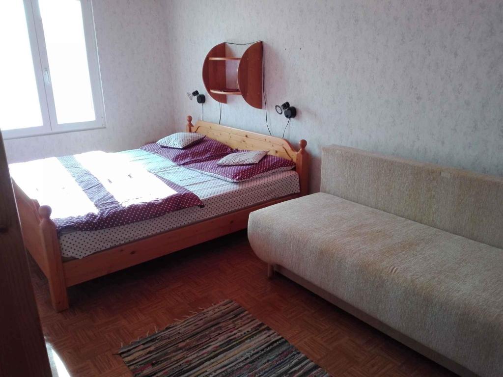 Łóżko lub łóżka w pokoju w obiekcie Holiday home in Balatonföldvar 36529