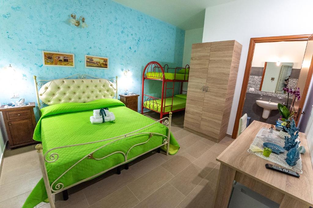Postel nebo postele na pokoji v ubytování La Scalinata