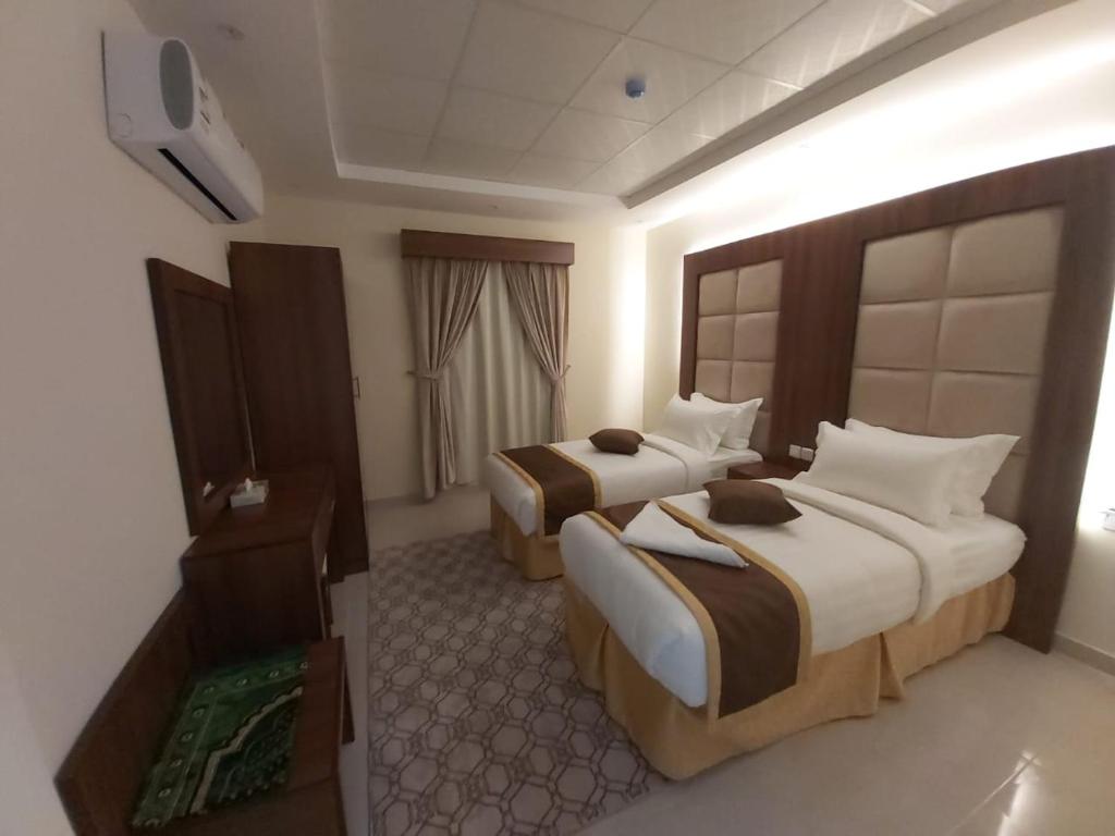 منازل الطيف للوحدات السكنية - Deluxe Room (2 Adults + 1 Child)
