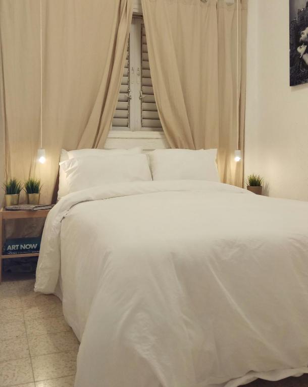 Cama ou camas em um quarto em Room in apartment