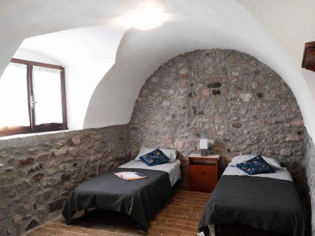 Posteľ alebo postele v izbe v ubytovaní Apartments in Tremosine/Gardasee 33428