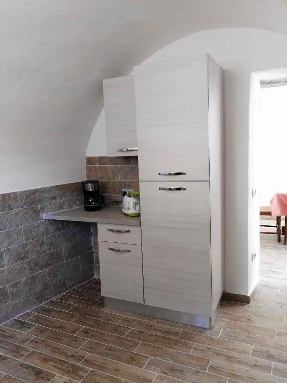 Kuchyňa alebo kuchynka v ubytovaní Apartments in Tremosine/Gardasee 33428