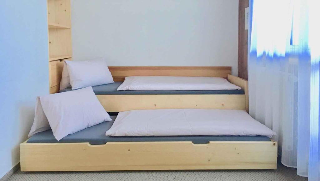 Postel nebo postele na pokoji v ubytování Apartments in Harrachov/Riesengebirge 2300