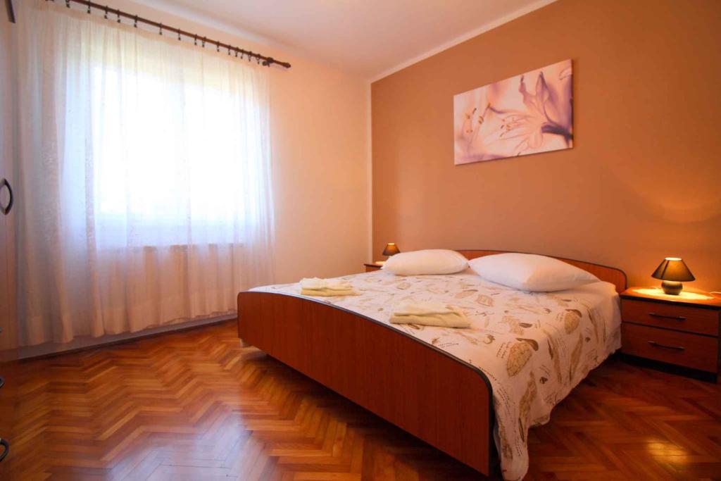 Łóżko lub łóżka w pokoju w obiekcie Apartment in Porec/Istrien 10031