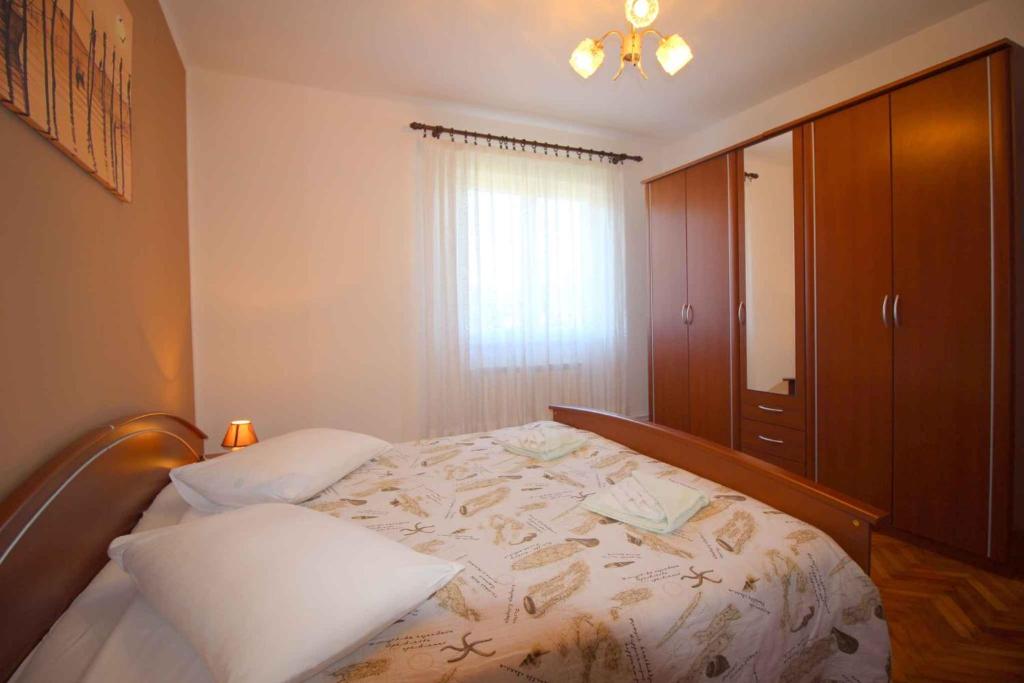Łóżko lub łóżka w pokoju w obiekcie Apartment in Porec/Istrien 10031