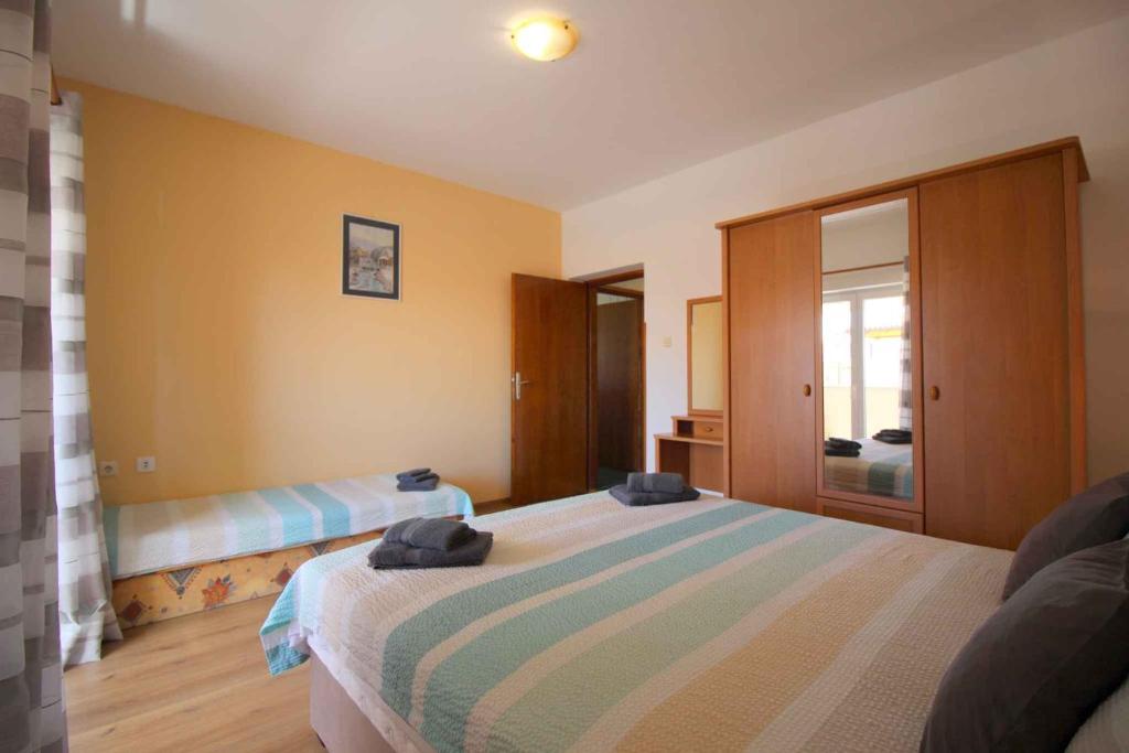 Posteľ alebo postele v izbe v ubytovaní Apartment in Porec/Istrien 10264