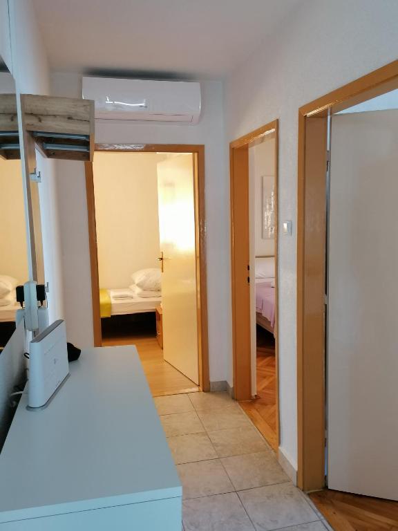 Posteľ alebo postele v izbe v ubytovaní Two-Bedroom Apartment in Baric Draga I