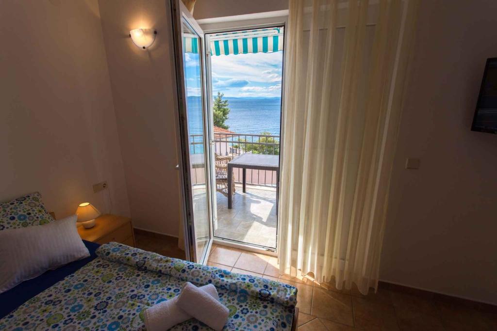 Posteľ alebo postele v izbe v ubytovaní Apartment in Okrug Gornji with 1