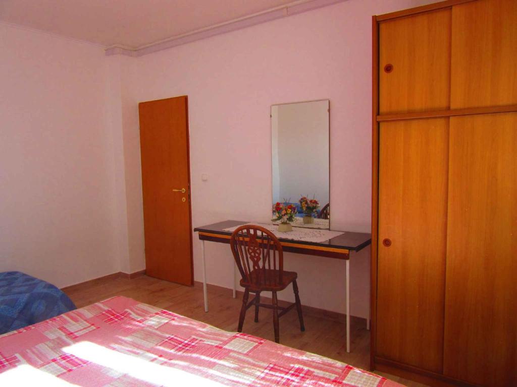 Łóżko lub łóżka w pokoju w obiekcie Two-Bedroom Apartment in Pula XI