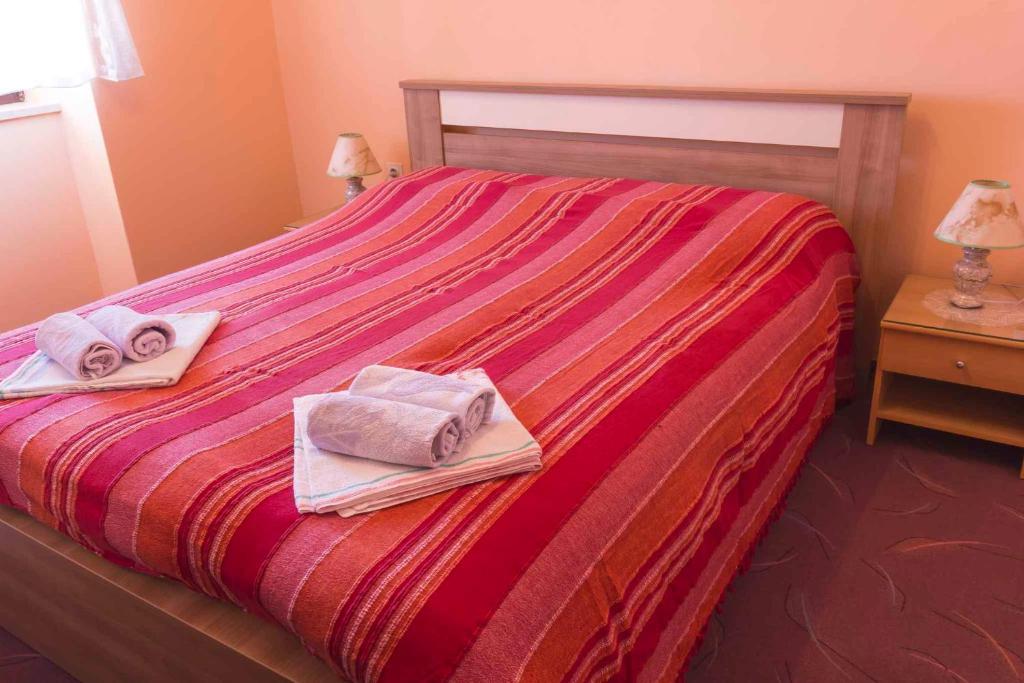 Postel nebo postele na pokoji v ubytování Holiday home in Moscenice 15209