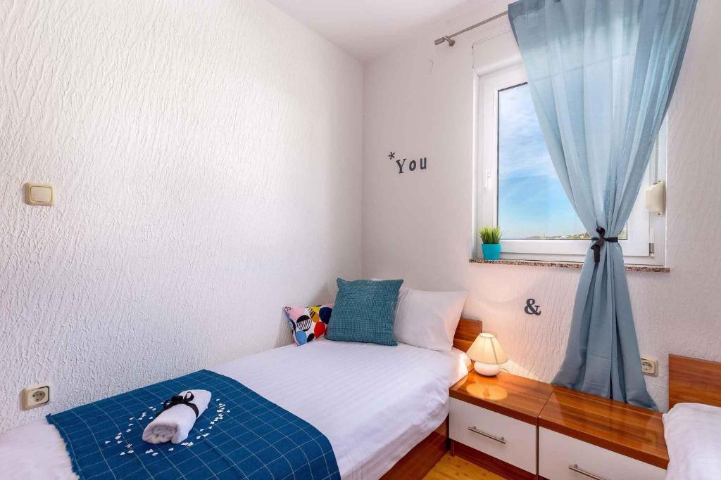 Postel nebo postele na pokoji v ubytování Crikvenica Apartment 16