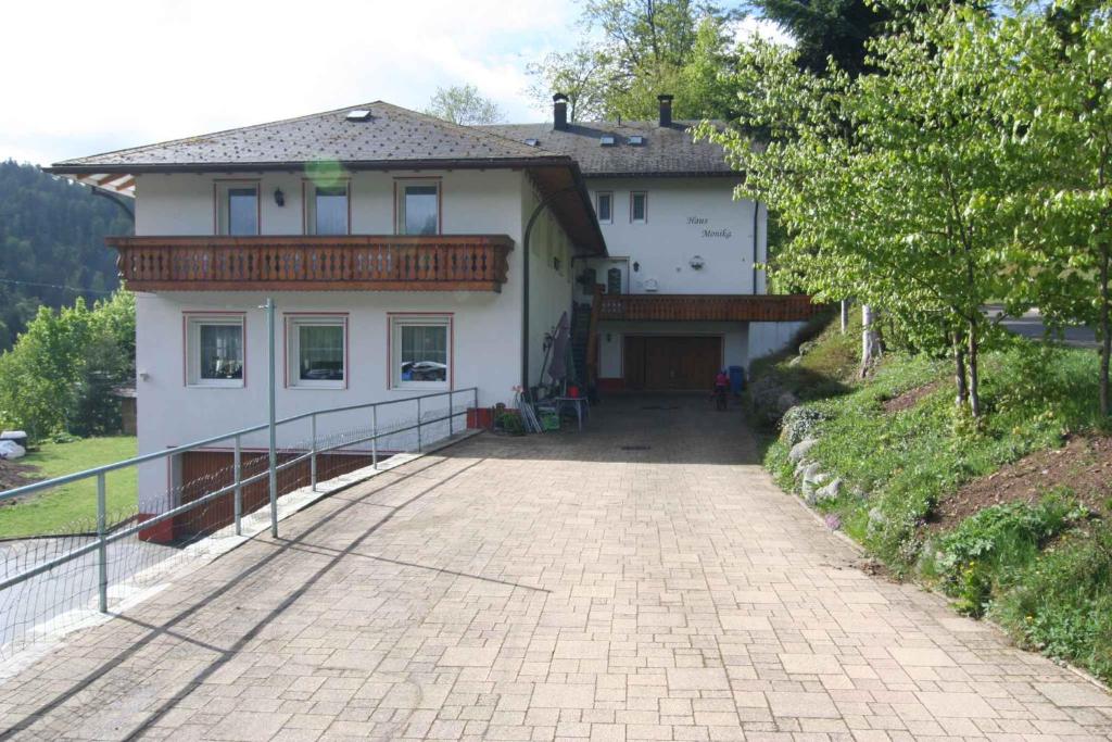 a house with a walkway in front of it at Apartment Todtmoos 4 in Vordertodtmoos