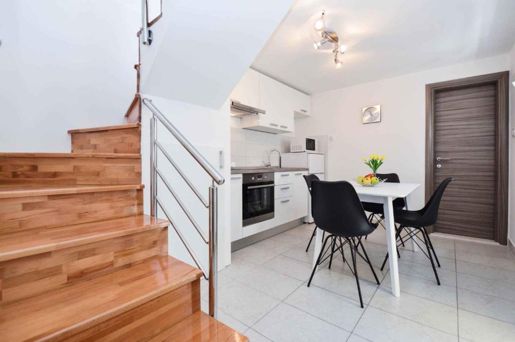 Kuchyň nebo kuchyňský kout v ubytování Holiday home Medulin 21
