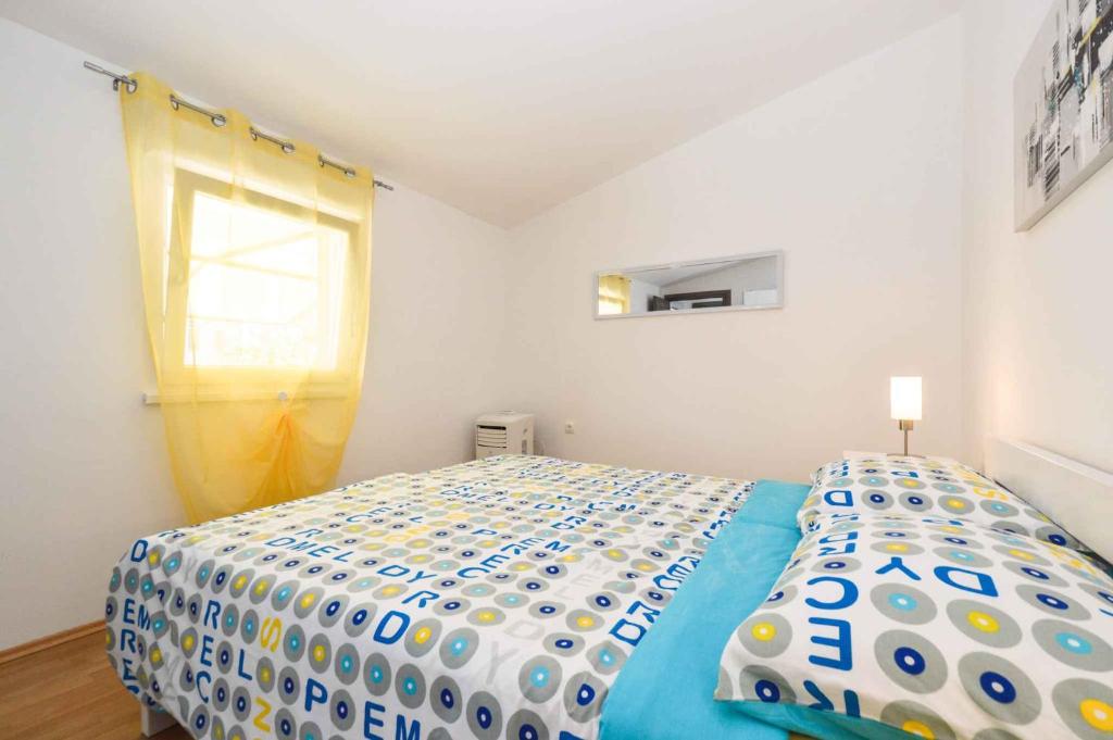 Postel nebo postele na pokoji v ubytování Holiday home Medulin 21