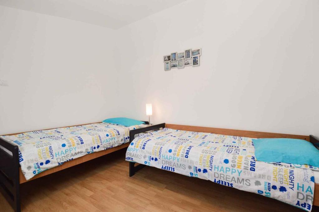Postel nebo postele na pokoji v ubytování Holiday home Medulin 21