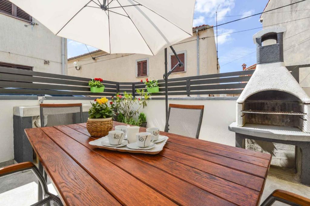 Balkón nebo terasa v ubytování Holiday home Medulin 21