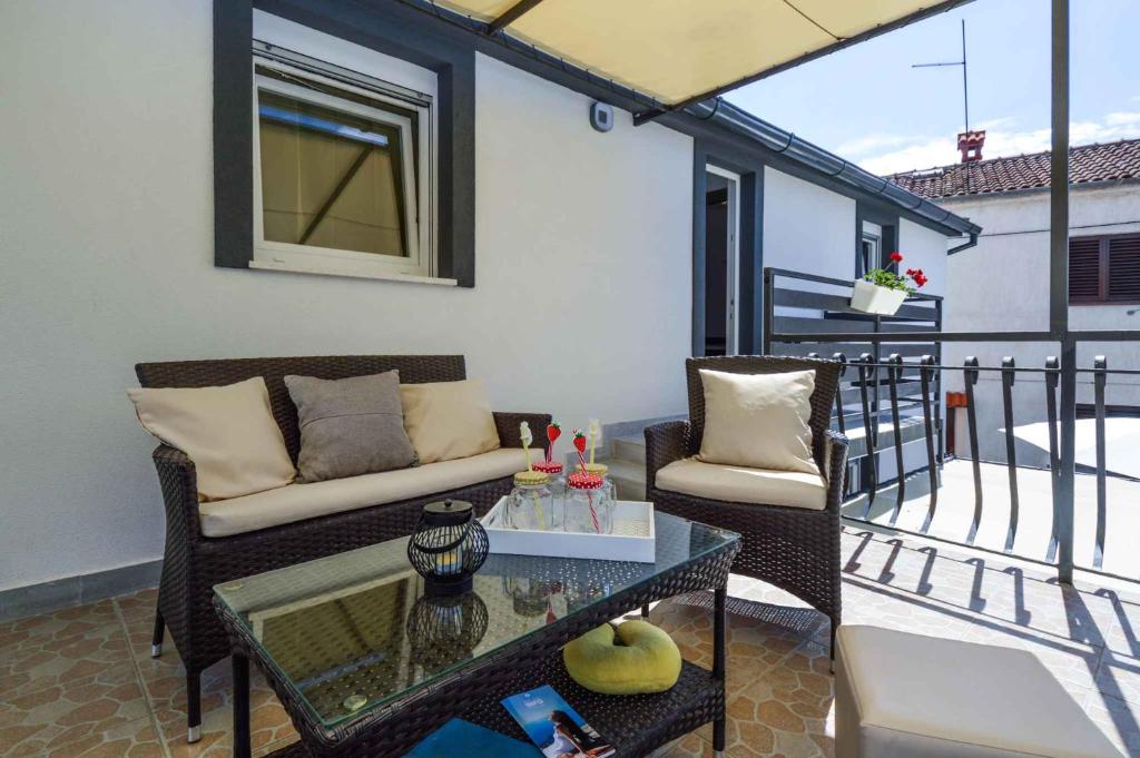 Balkón nebo terasa v ubytování Holiday home Medulin 21