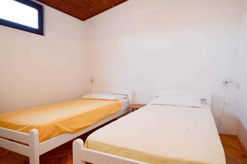 Łóżko lub łóżka w pokoju w obiekcie Apartment in Pula/Istrien 11443