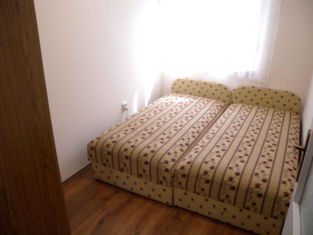 Posteľ alebo postele v izbe v ubytovaní Apartment Balatonfenyves - Balaton 18390
