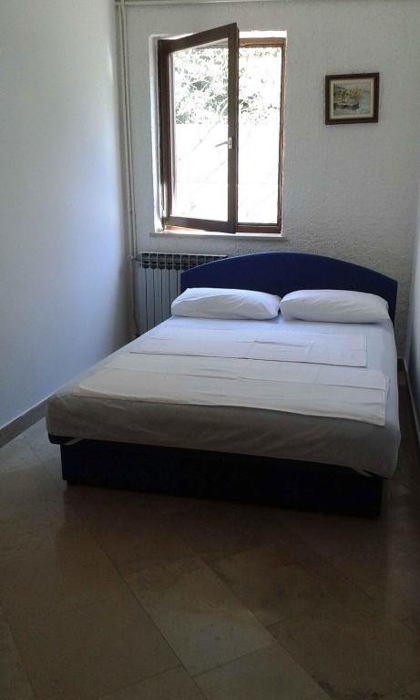 Posteľ alebo postele v izbe v ubytovaní Apartment Sv. Juraj 4