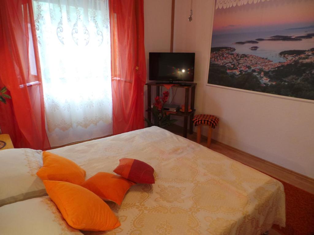 Posteľ alebo postele v izbe v ubytovaní Apartment Jablanac 1