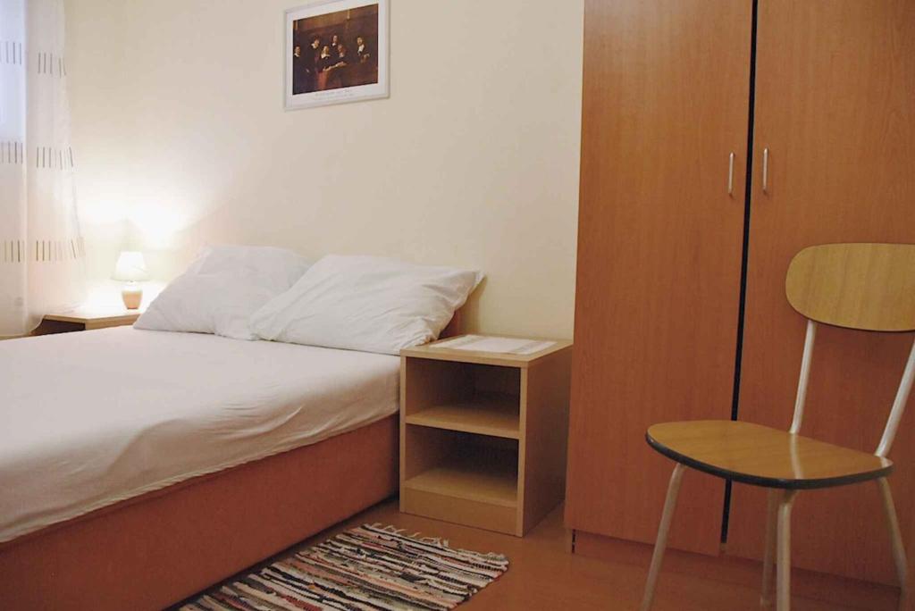 Postel nebo postele na pokoji v ubytování Holiday home in Vir/Insel Vir 7481