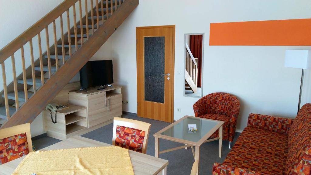TV a/nebo společenská místnost v ubytování Hotel Fortuna
