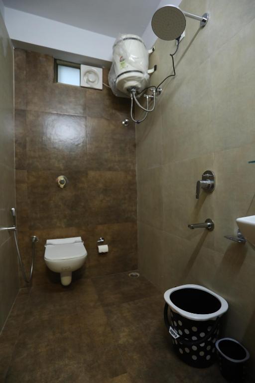 Koupelna v ubytování VIPs Hotel Olive