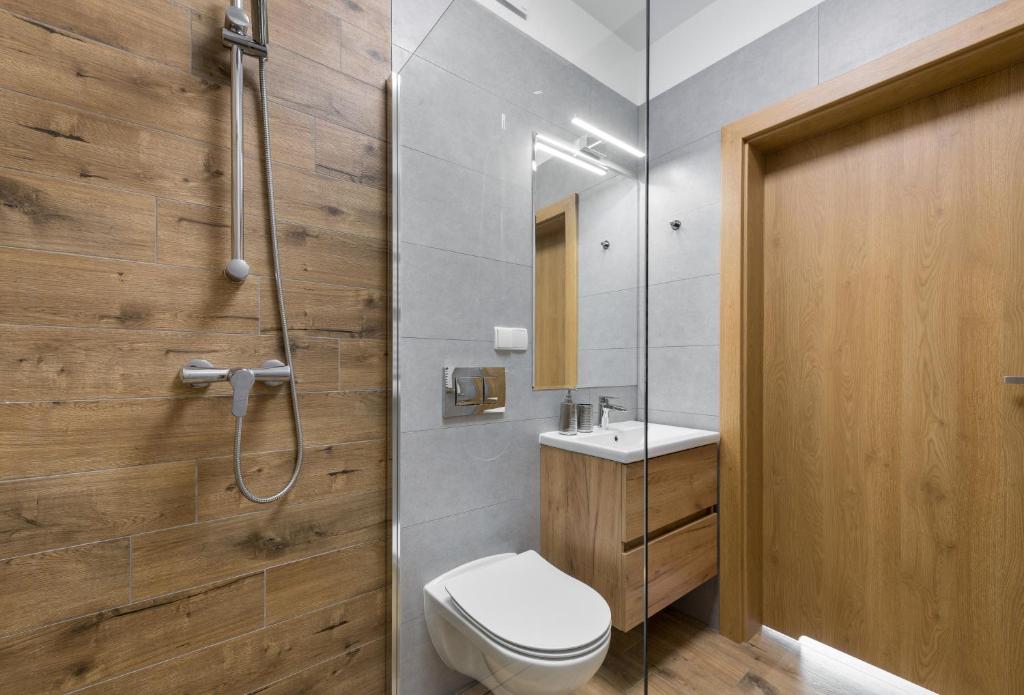 Kúpeľňa v ubytovaní Apartamenty Skibowianka