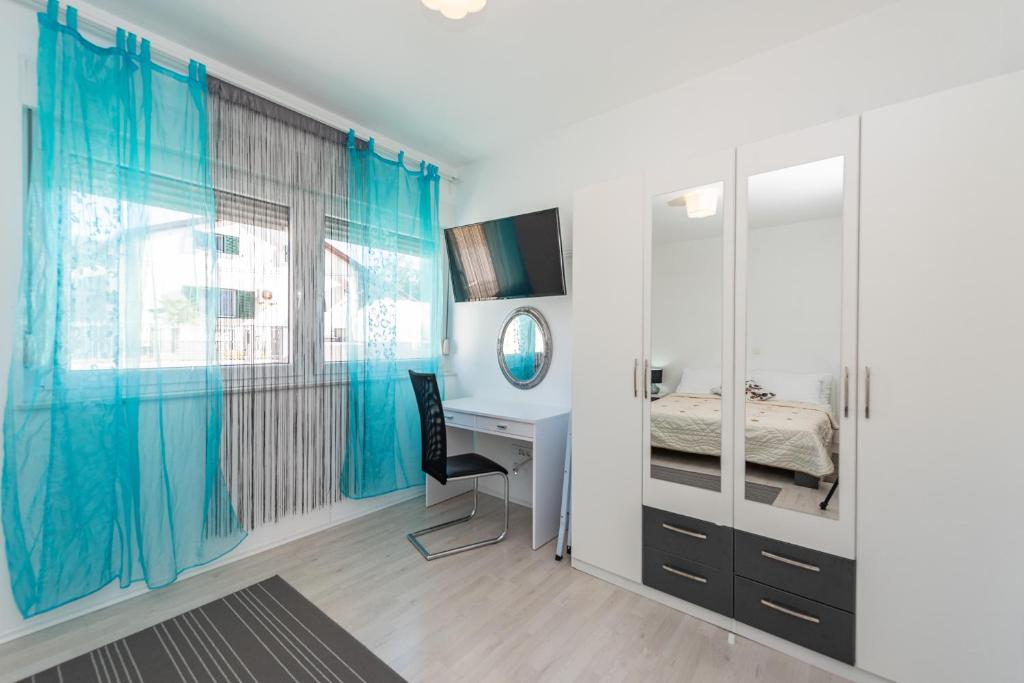 Posteľ alebo postele v izbe v ubytovaní Antonio Apartments