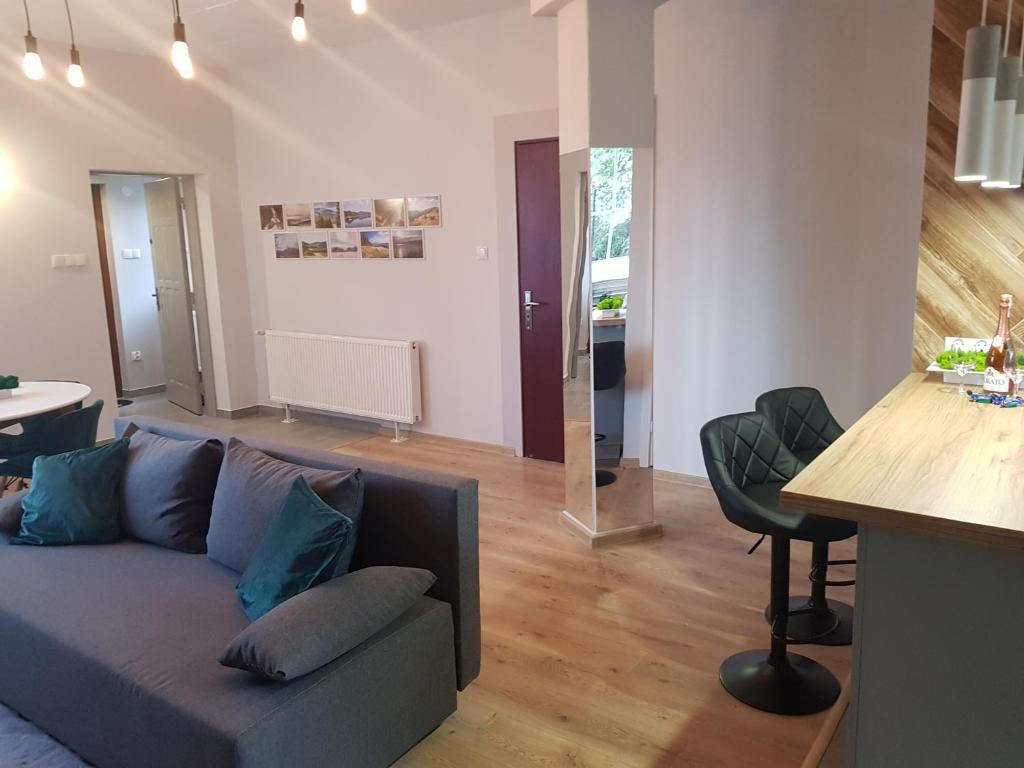 Posezení v ubytování Apartamenty Paszkówka