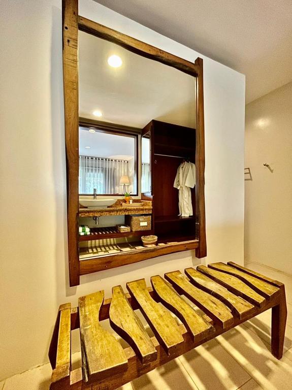 Postel nebo postele na pokoji v ubytování Amun Ini Beach Resort & Spa