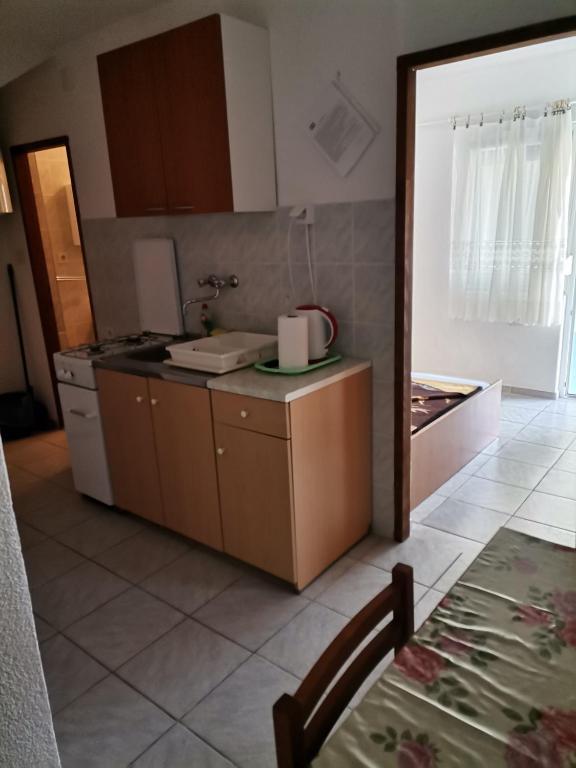 Kuchyň nebo kuchyňský kout v ubytování Danijela