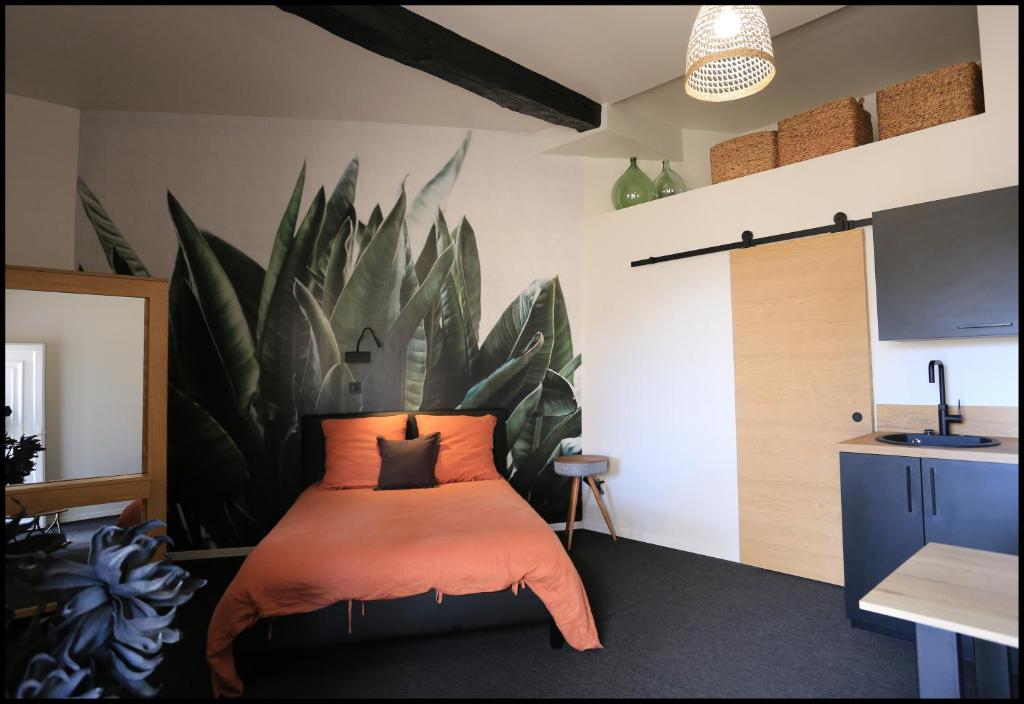 A bed or beds in a room at LeDeN