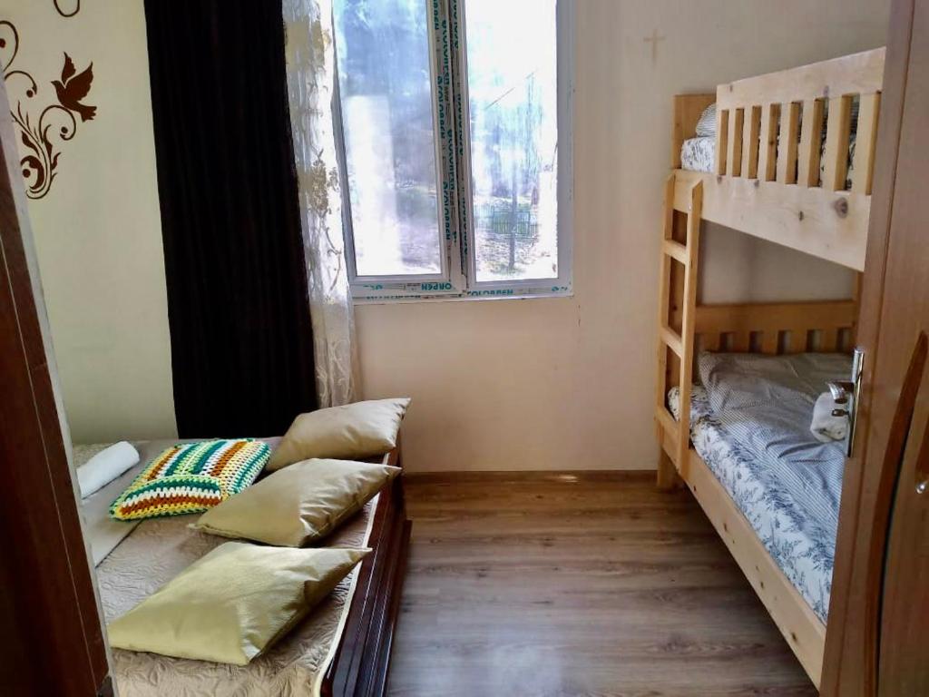 Postel nebo postele na pokoji v ubytování NaBaDa