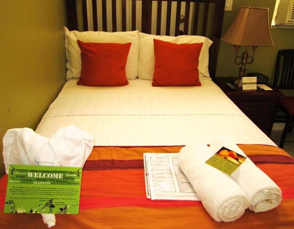 Postel nebo postele na pokoji v ubytování Narakiel's Inn