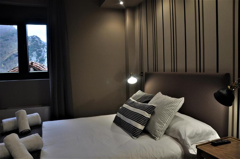 Posteľ alebo postele v izbe v ubytovaní Apartamentos Las Agüeras