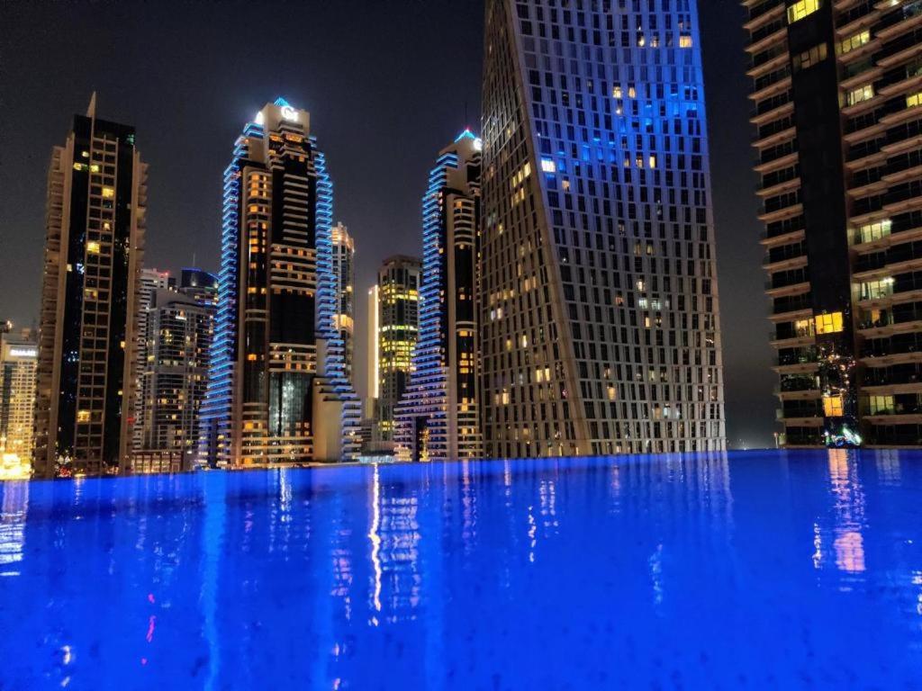 The swimming pool at or near 4201 Design Apartment by Jumeirah Living Dubai Marina