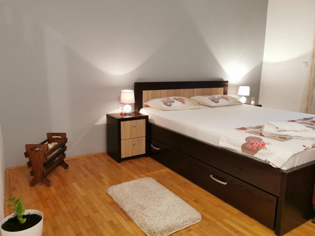 Uma cama ou camas num quarto em Apartment Vukasevic
