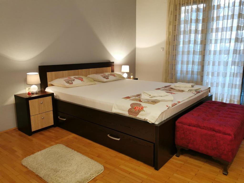 Uma cama ou camas num quarto em Apartment Vukasevic