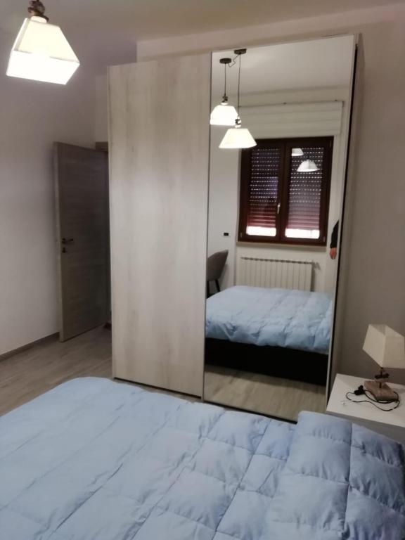 Łóżko lub łóżka w pokoju w obiekcie B&B Bovianum