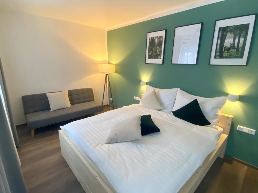 A bed or beds in a room at Haus Stadler - Self Check-in