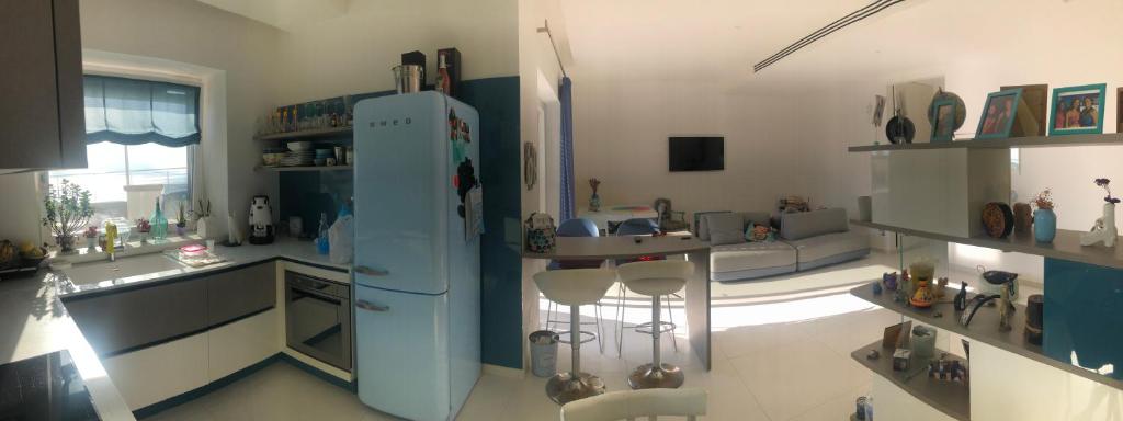 Kuchyň nebo kuchyňský kout v ubytování Manu's House Villetta Indipendente