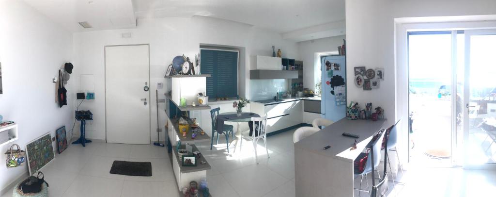 Kuchyň nebo kuchyňský kout v ubytování Manu's House Villetta Indipendente