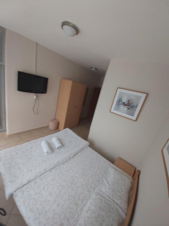 A bed or beds in a room at SC Kolos